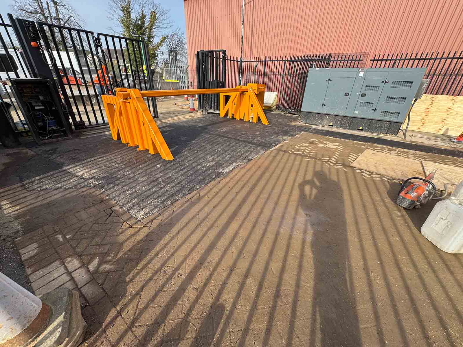Access road surfacing repair barriers in Surrey