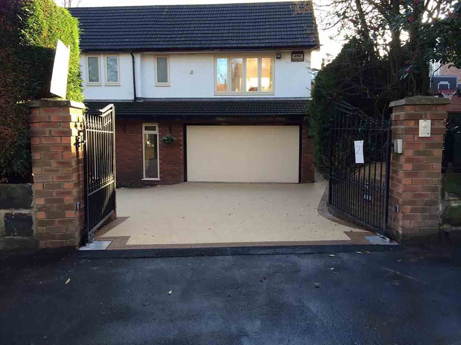 Tarmac driveway gated entrance in Weybridge