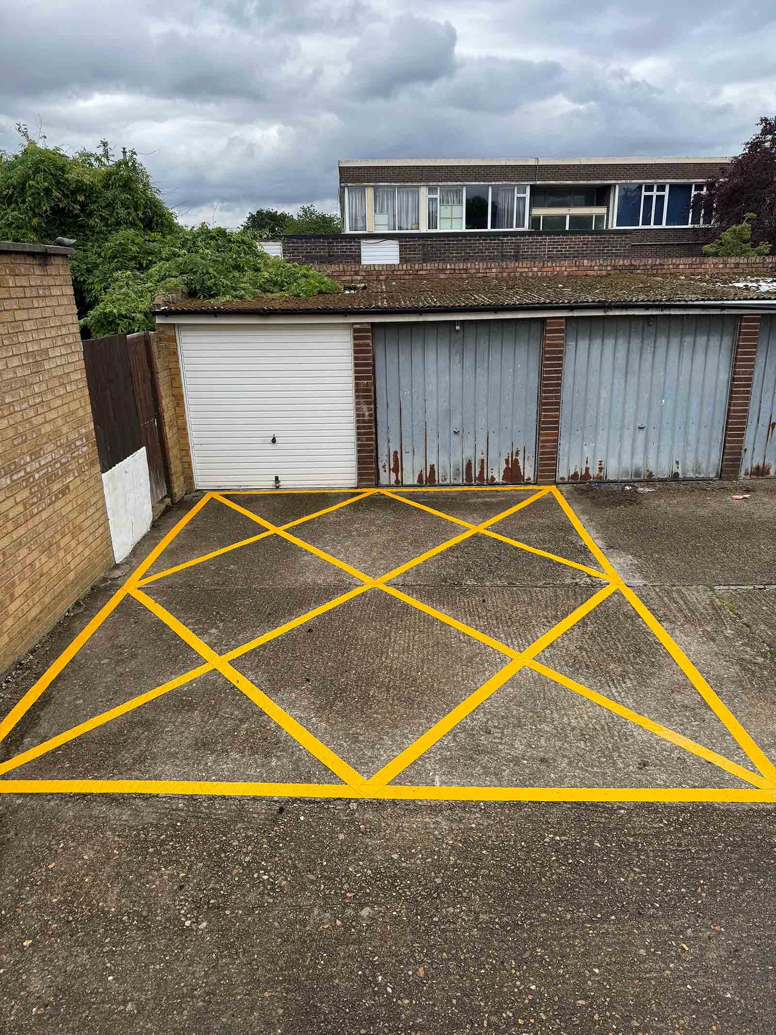 Garage access line marking Weybridge Fresh yellow box markings in Weybridge